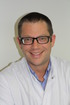 Dr. med. Axel Menzebach, M.A.